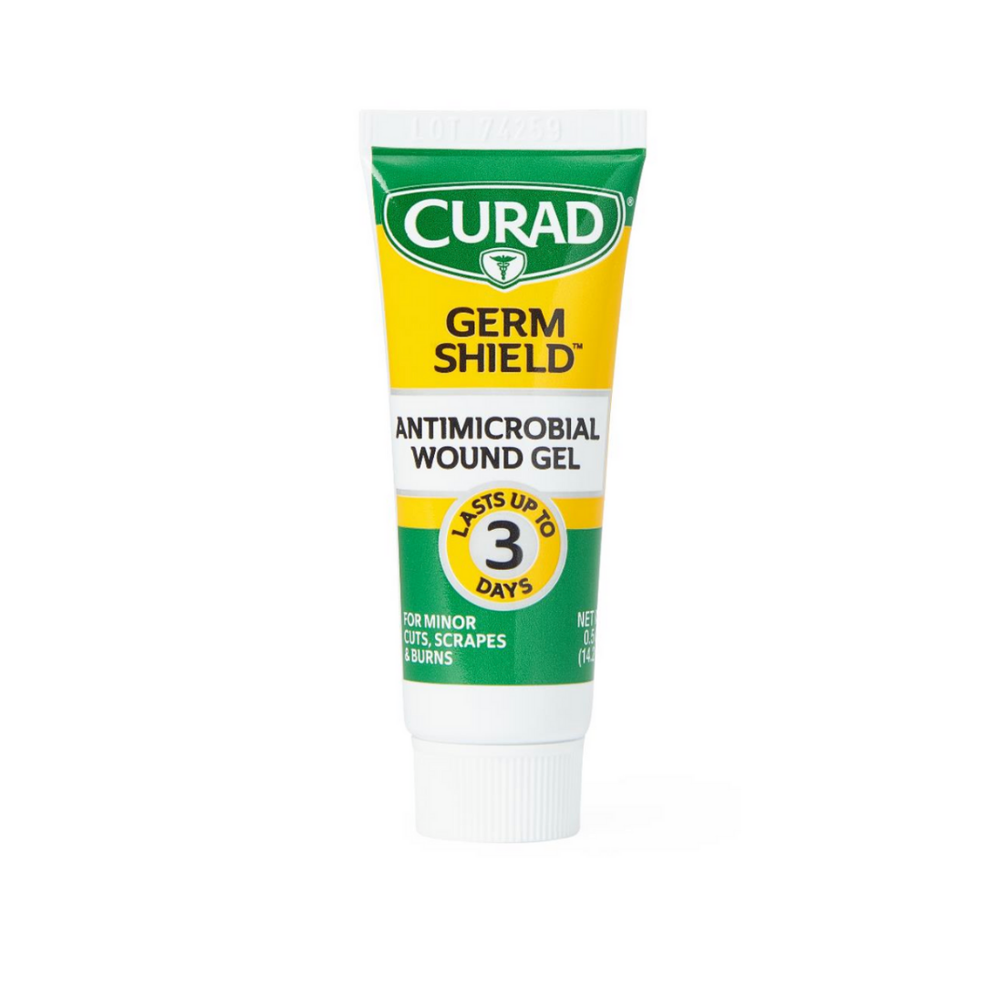 A white tube of Medline CURAD Germ Shield Antimicrobial Wound Gel for minor cuts, scrapes, and burns, offering antimicrobial protection and wound healing for up to 3 days. The tube features green and yellow accents.